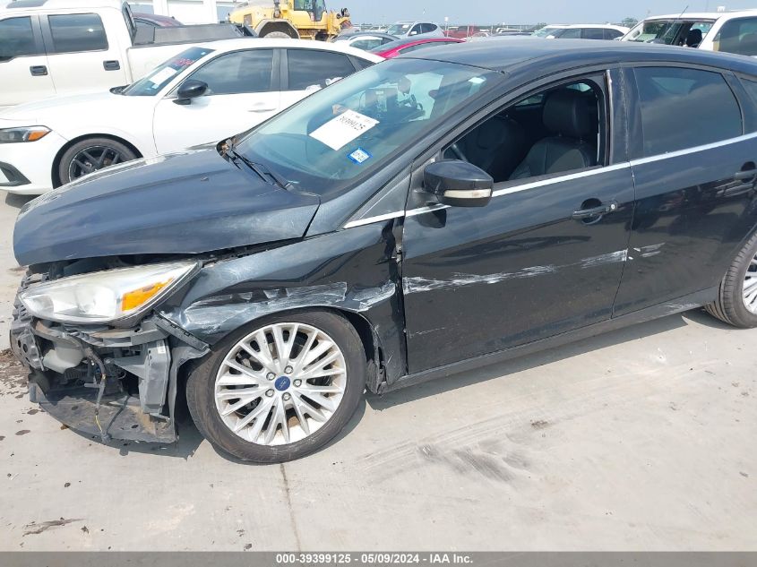 2015 Ford Focus Titanium VIN: 1FADP3N21FL386871 Lot: 39399125