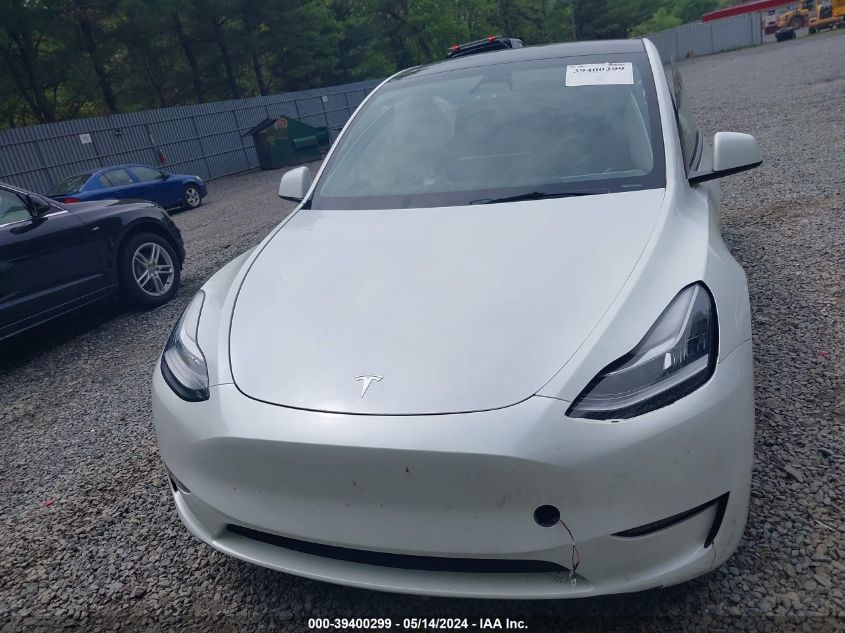 2023 Tesla Model Y Awd/Long Range Dual Motor All-Wheel Drive VIN: 7SAYGDEE4PA057212 Lot: 39400299