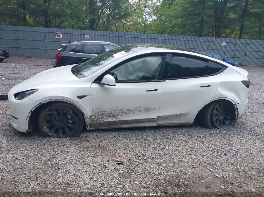 2023 Tesla Model Y Awd/Long Range Dual Motor All-Wheel Drive VIN: 7SAYGDEE4PA057212 Lot: 39400299