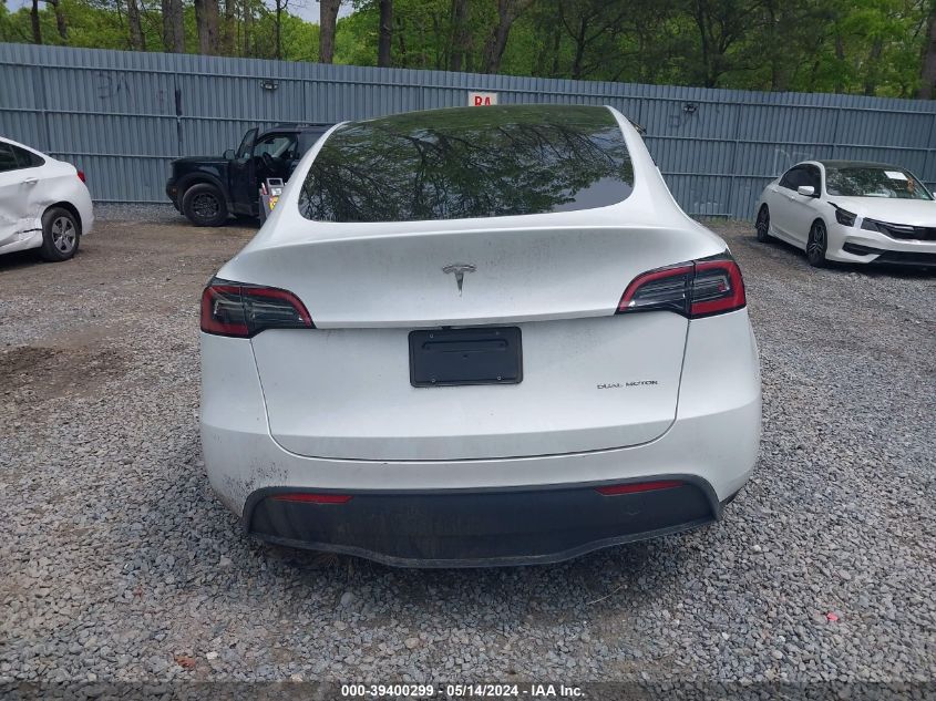 2023 Tesla Model Y Awd/Long Range Dual Motor All-Wheel Drive VIN: 7SAYGDEE4PA057212 Lot: 39400299