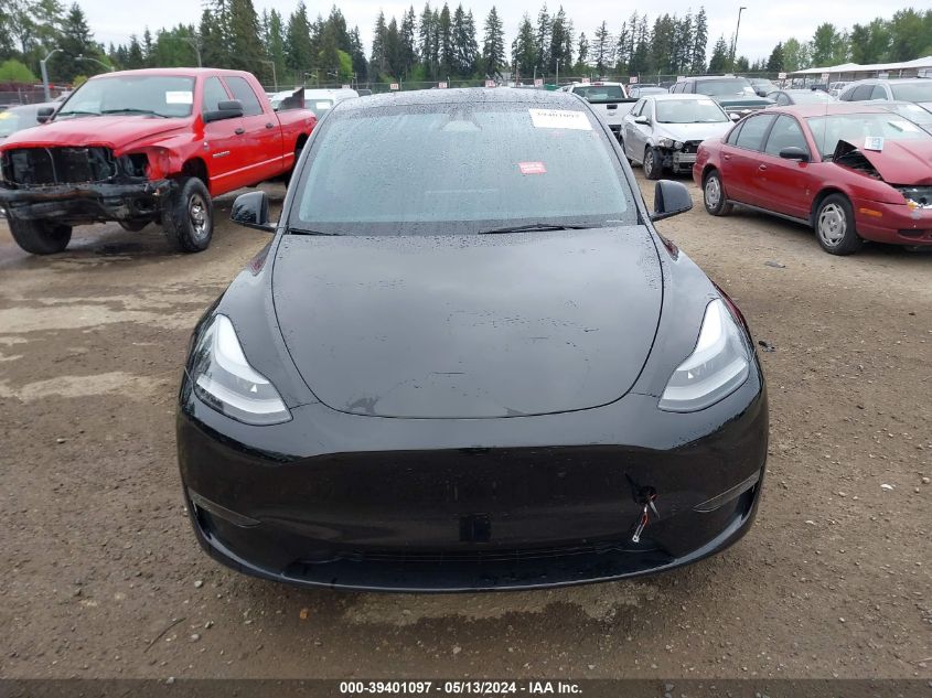 2023 Tesla Model Y Awd/Long Range Dual Motor All-Wheel Drive VIN: 7SAYGDEE6PF843869 Lot: 39401097