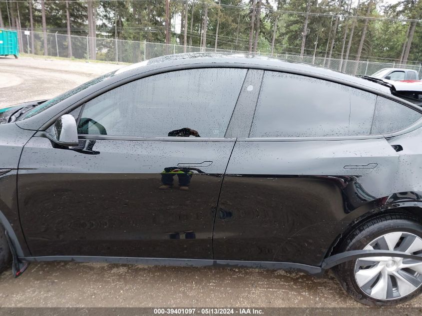 2023 Tesla Model Y Awd/Long Range Dual Motor All-Wheel Drive VIN: 7SAYGDEE6PF843869 Lot: 39401097