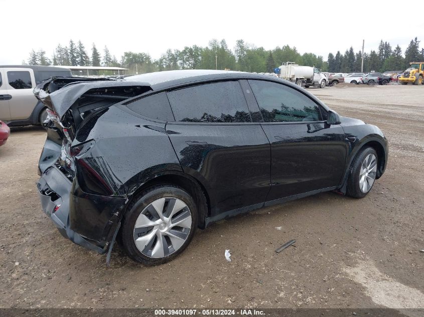 2023 Tesla Model Y Awd/Long Range Dual Motor All-Wheel Drive VIN: 7SAYGDEE6PF843869 Lot: 39401097