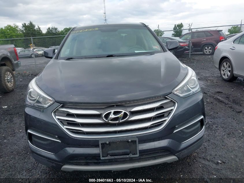 2018 Hyundai Santa Fe Sport 2.4L VIN: 5XYZTDLB0JG563645 Lot: 39401663