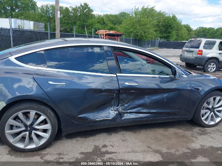 2018 Tesla Model 3 Long Range/Performance VIN: 5YJ3E1EB7JF077000 Lot: 39402960