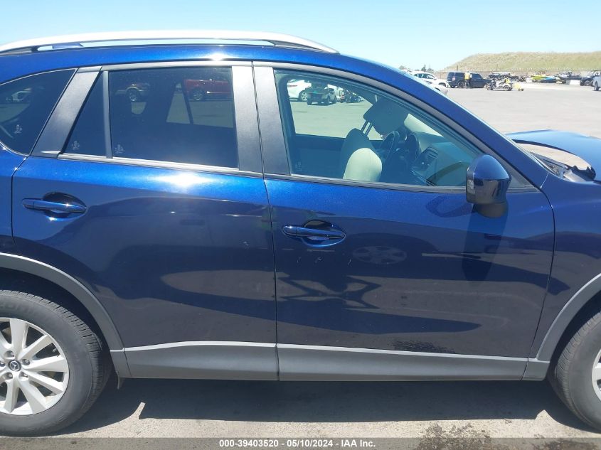 2014 Mazda Cx-5 Touring VIN: JM3KE2CY3E0374852 Lot: 39403520