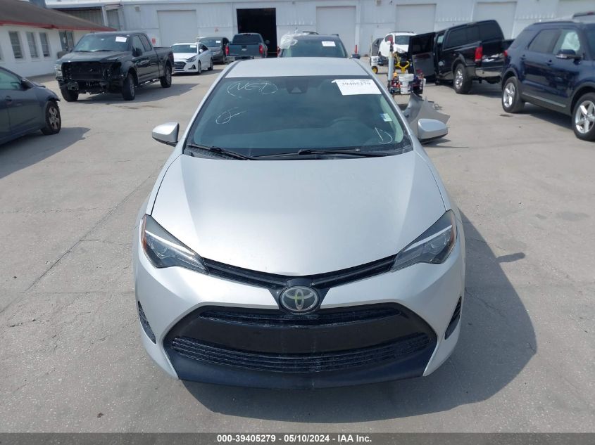 2017 Toyota Corolla Le VIN: 5YFBURHE0HP711488 Lot: 39405279