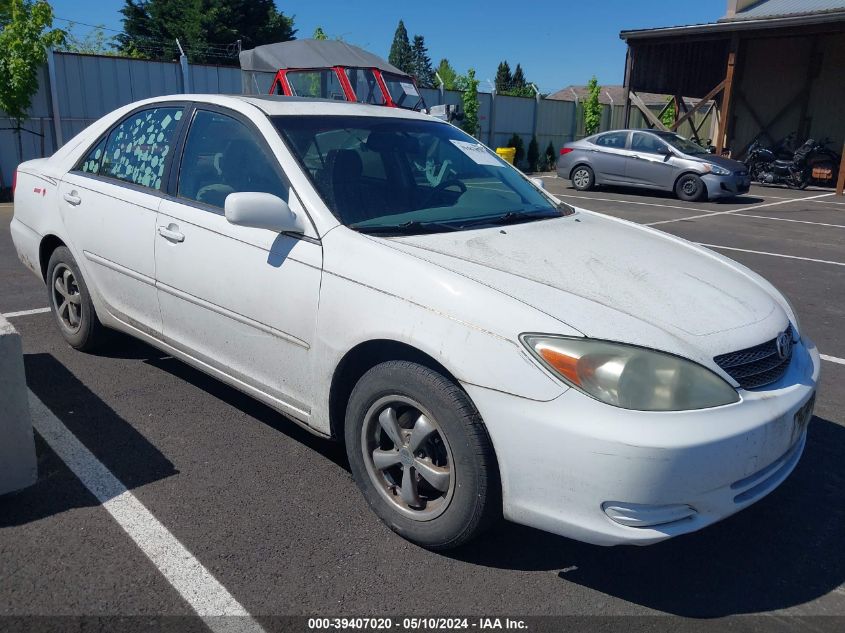 2003 Toyota Camry Le VIN: JTDBE32K730184724 Lot: 39407020