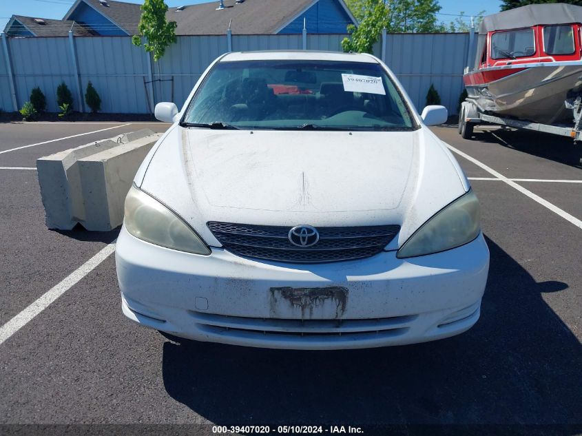 2003 Toyota Camry Le VIN: JTDBE32K730184724 Lot: 39407020