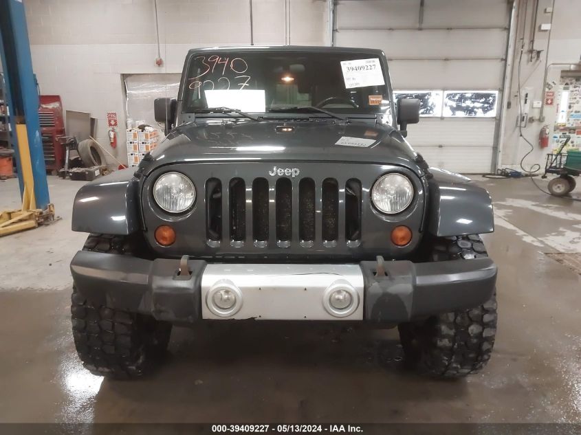 2010 Jeep Wrangler Unlimited Sahara VIN: 1J4BA5H1XAL124271 Lot: 39409227