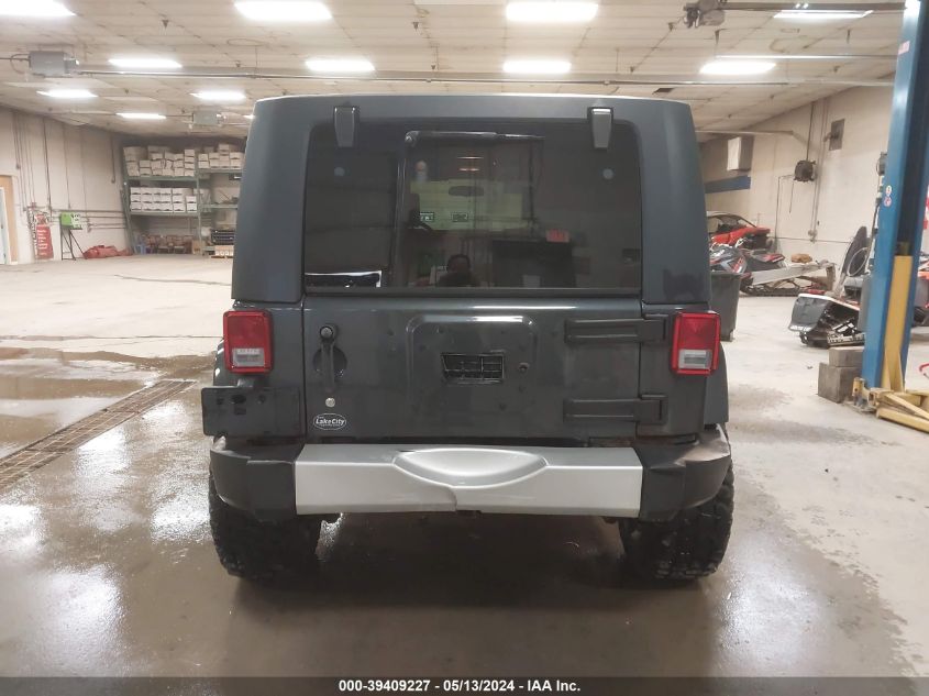 2010 Jeep Wrangler Unlimited Sahara VIN: 1J4BA5H1XAL124271 Lot: 39409227