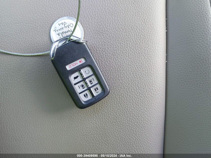 2023 Honda Odyssey Touring VIN: 5FNRL6H87PB037439 Lot: 39409598