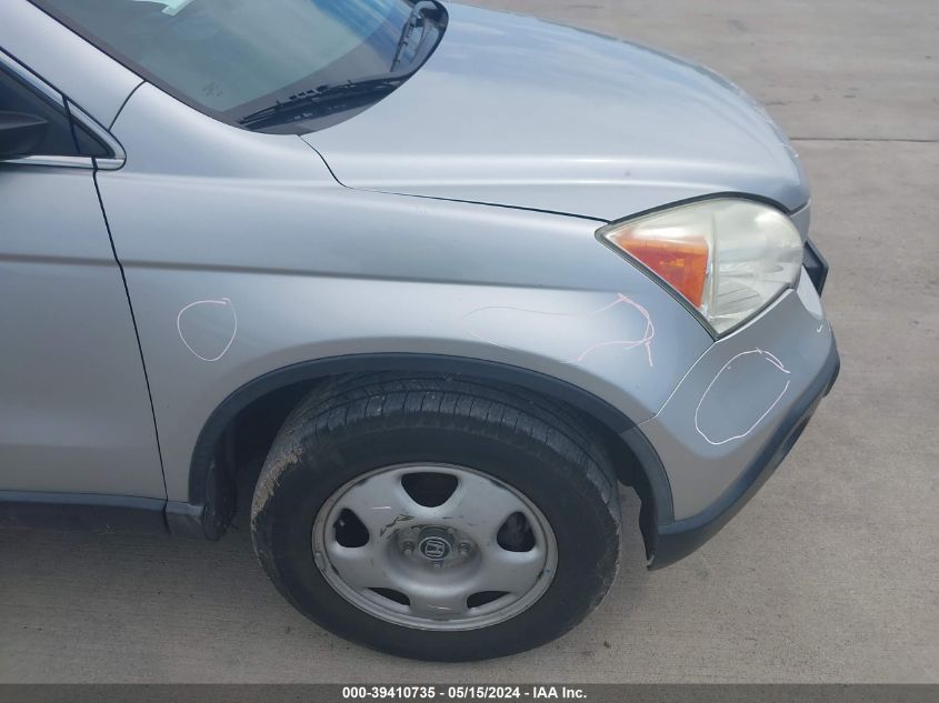 2009 Honda Cr-V Lx VIN: 3CZRE38369G700374 Lot: 39410735