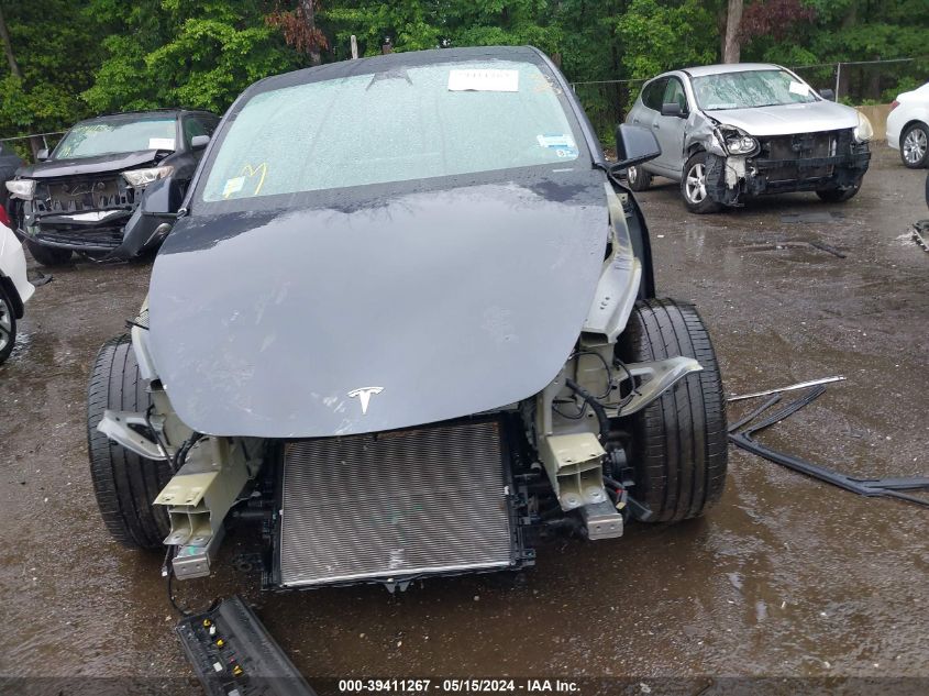 2022 Tesla Model Y Long Range Dual Motor All-Wheel Drive VIN: 7SAYGAEE7NF515744 Lot: 39411267