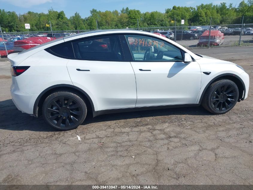 2023 Tesla Model Y Awd/Long Range Dual Motor All-Wheel Drive VIN: 7SAYGDEE0PF844130 Lot: 39413947