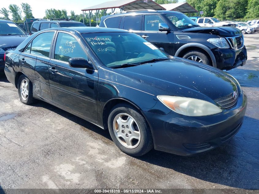 2002 Toyota Camry Le V6 VIN: 4T1BF30K72U034194 Lot: 39415318