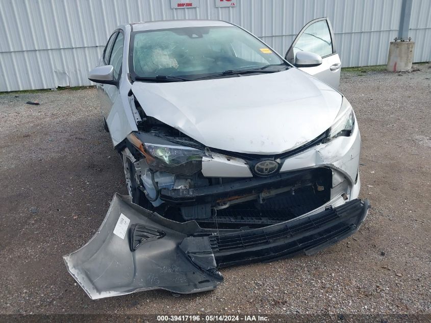 2017 Toyota Corolla Le VIN: 5YFBURHE6HP698570 Lot: 39417196