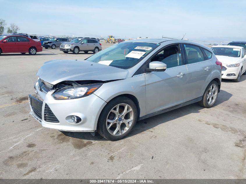 2012 Ford Focus Titanium VIN: 1FAHP3N27CL323853 Lot: 39417674