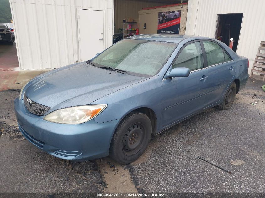 2002 Toyota Camry Le VIN: 4T1BE32K62U580100 Lot: 40708798