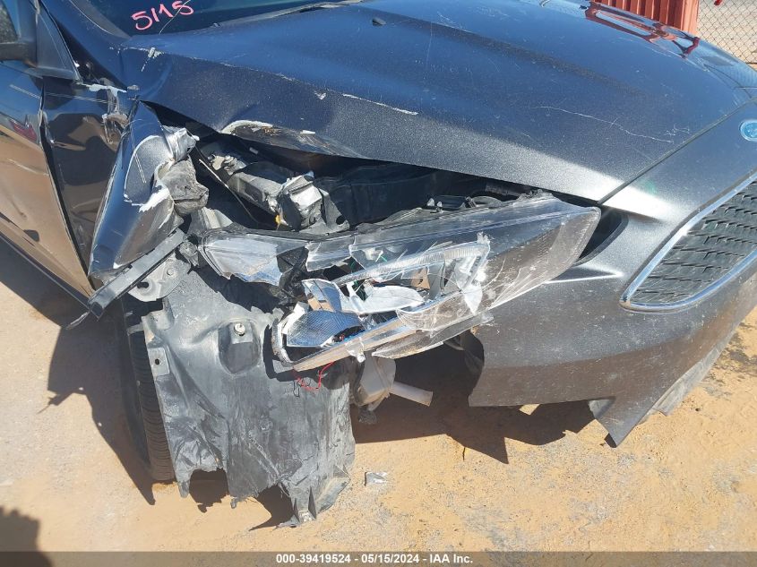 2015 Ford Focus Se VIN: 1FADP3F21FL204116 Lot: 39419524