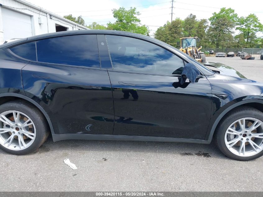 2023 Tesla Model Y Awd/Long Range Dual Motor All-Wheel Drive VIN: 7SAYGAEE1PF847374 Lot: 39420115