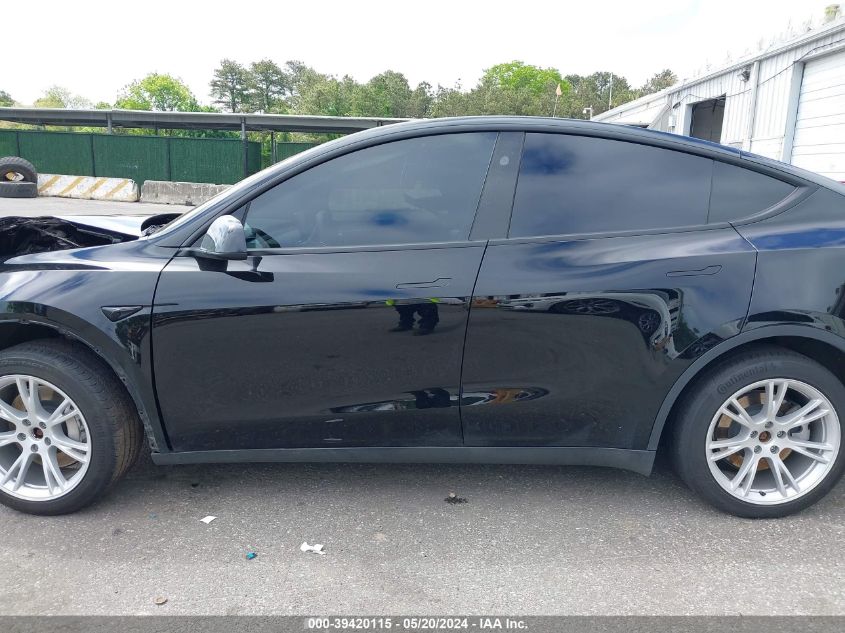 2023 Tesla Model Y Awd/Long Range Dual Motor All-Wheel Drive VIN: 7SAYGAEE1PF847374 Lot: 39420115