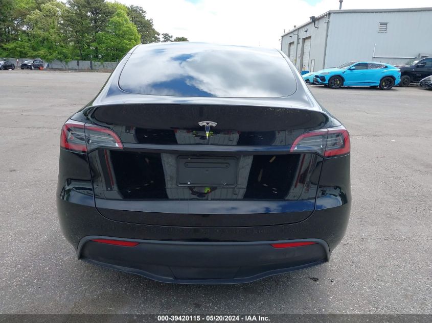 2023 Tesla Model Y Awd/Long Range Dual Motor All-Wheel Drive VIN: 7SAYGAEE1PF847374 Lot: 39420115