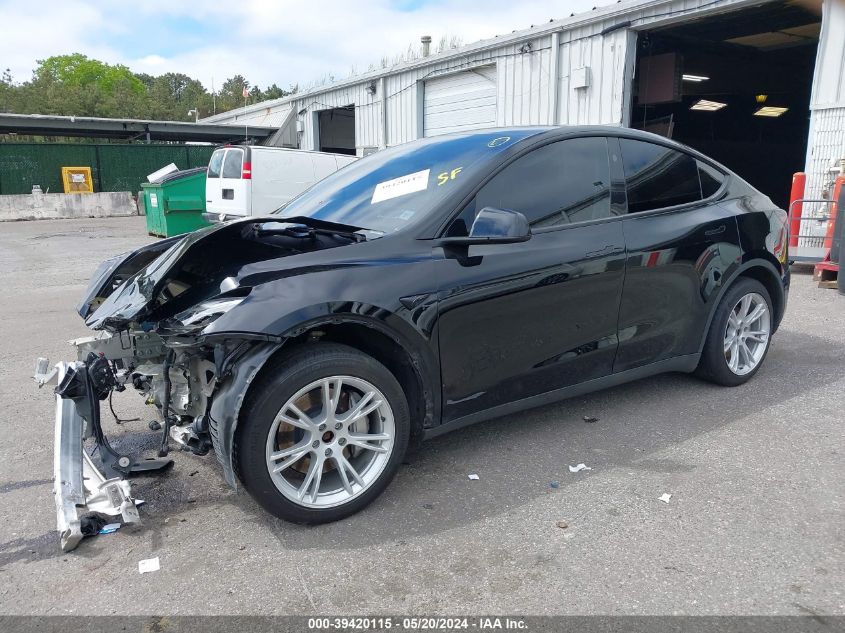 2023 Tesla Model Y Awd/Long Range Dual Motor All-Wheel Drive VIN: 7SAYGAEE1PF847374 Lot: 39420115