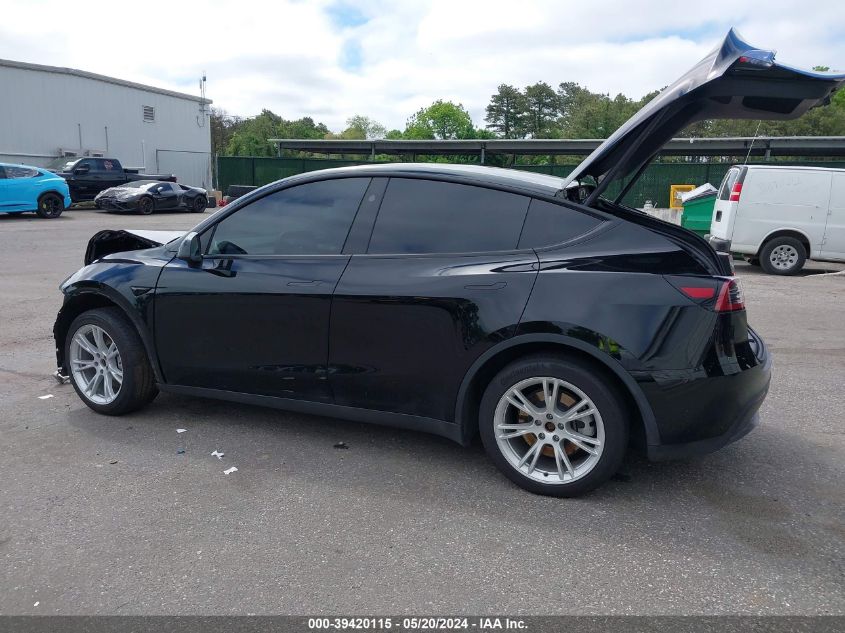 2023 Tesla Model Y Awd/Long Range Dual Motor All-Wheel Drive VIN: 7SAYGAEE1PF847374 Lot: 39420115