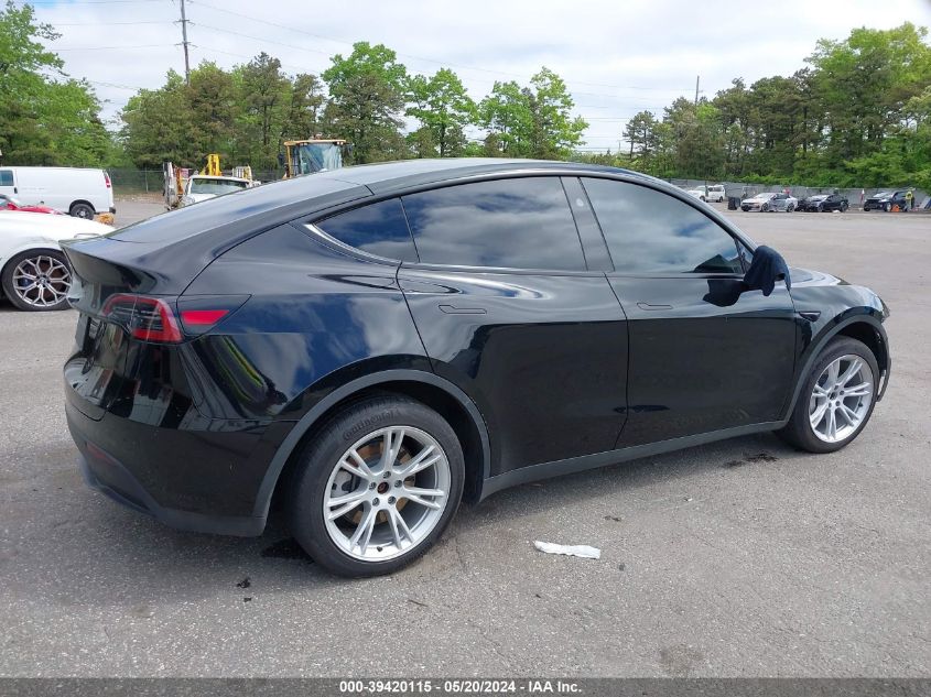 2023 Tesla Model Y Awd/Long Range Dual Motor All-Wheel Drive VIN: 7SAYGAEE1PF847374 Lot: 39420115