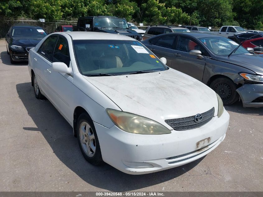 2002 Toyota Camry Le VIN: 4T1BE32K92U071618 Lot: 39420548