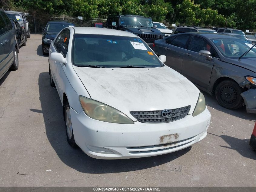 2002 Toyota Camry Le VIN: 4T1BE32K92U071618 Lot: 39420548