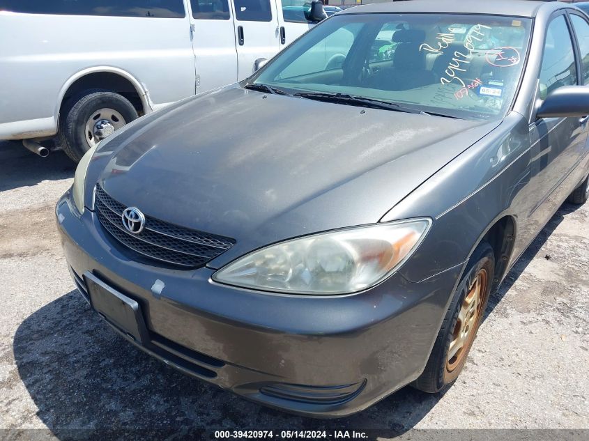 2003 Toyota Camry Le V6 VIN: 4T1BF32K13U557533 Lot: 39420974