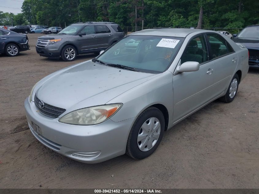 2002 Toyota Camry Le VIN: 4T1BE32K12U059270 Lot: 39421452