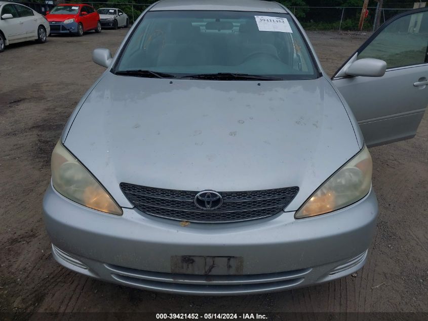 2002 Toyota Camry Le VIN: 4T1BE32K12U059270 Lot: 39421452