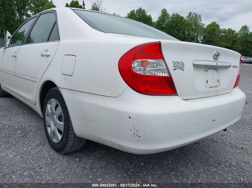 2003 Toyota Camry Le VIN: 4T1BE32K13U130565 Lot: 39423001