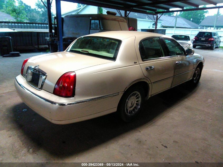 1999 Lincoln Town Car Cartier VIN: 1LNHM83WOXY687848 Lot: 39423369