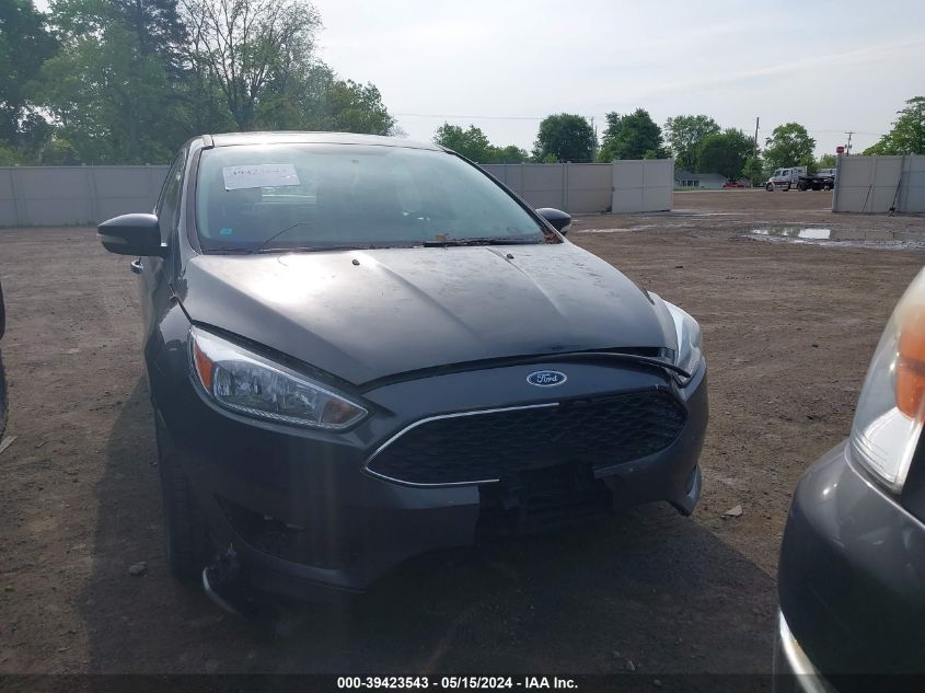 2015 Ford Focus Se VIN: 1FADP3F28FL356331 Lot: 39423543