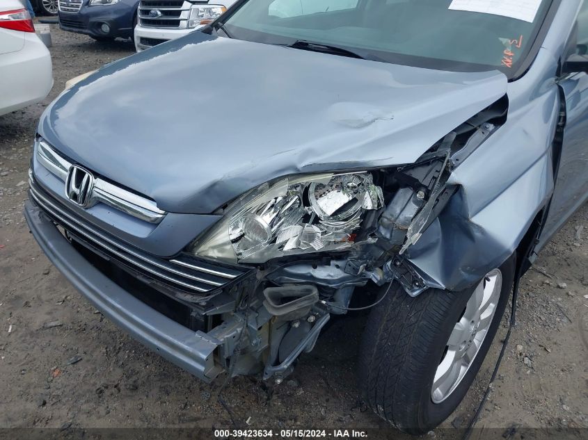 2009 Honda Cr-V Ex VIN: 3CZRE38599G704890 Lot: 39423634