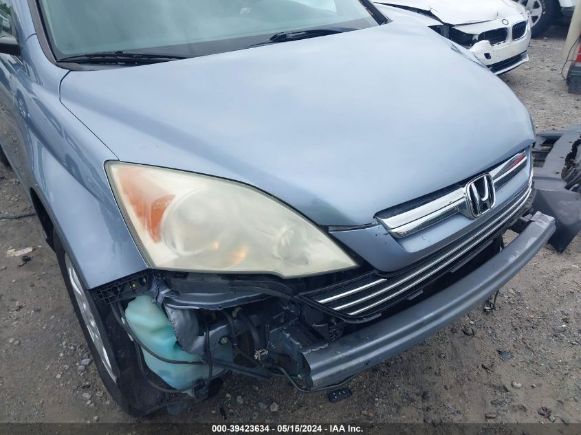 2009 Honda Cr-V Ex VIN: 3CZRE38599G704890 Lot: 39423634