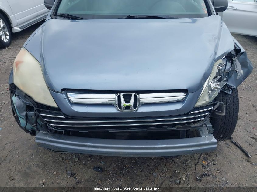 2009 Honda Cr-V Ex VIN: 3CZRE38599G704890 Lot: 39423634