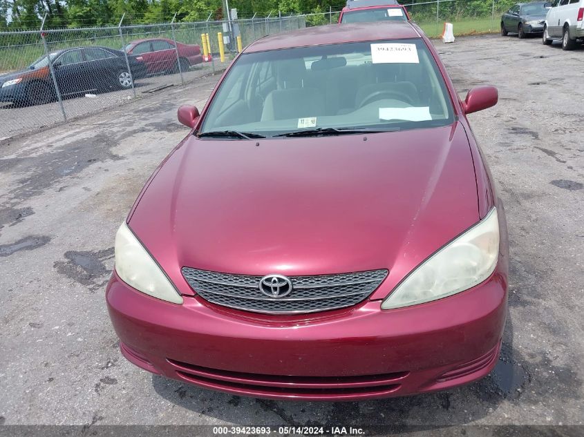 2004 Toyota Camry Le V6 VIN: 4T1BF30KX4U072215 Lot: 39423693