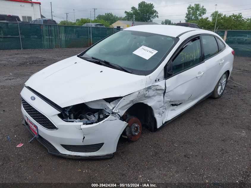 2018 Ford Focus Se VIN: 1FADP3F2XJL310069 Lot: 39424304