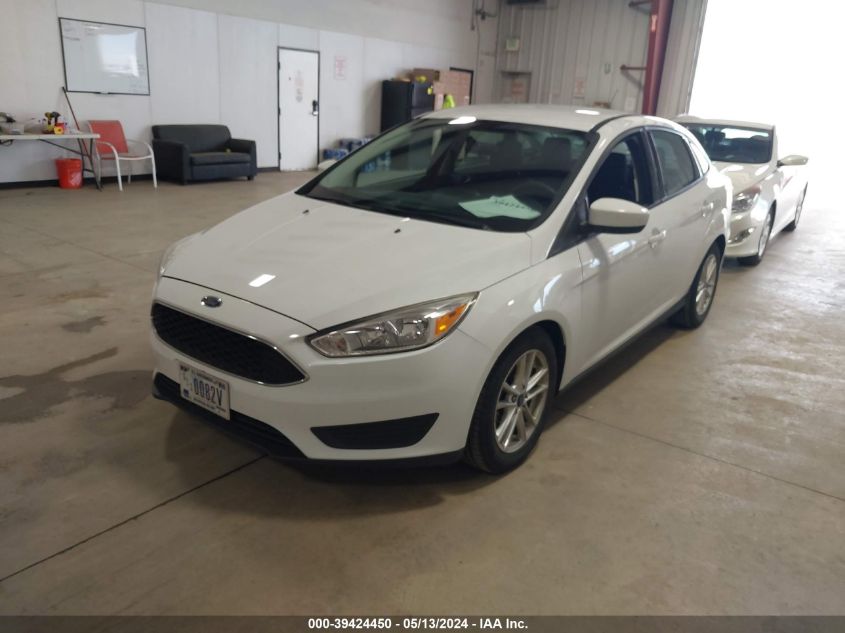 2018 Ford Focus Se VIN: 1FADP3F28JL328635 Lot: 39424450