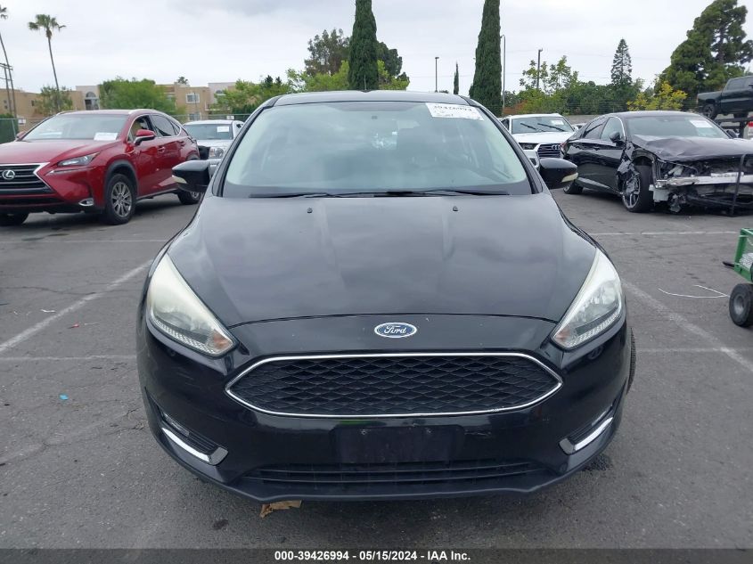 2015 Ford Focus Se VIN: 1FADP3K27FL201582 Lot: 39426994