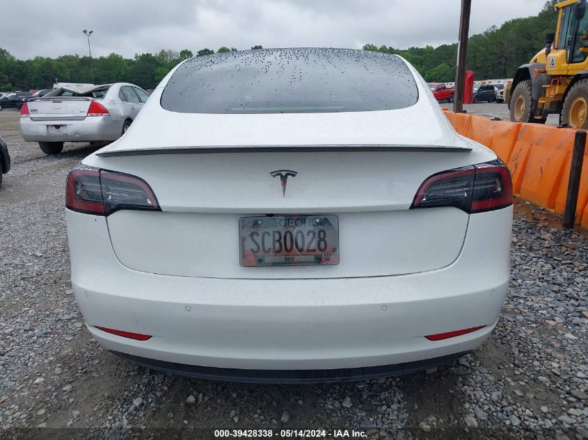 2021 Tesla Model 3 Standard Range Plus Rear-Wheel Drive VIN: 5YJ3E1EA1MF086027 Lot: 39428338