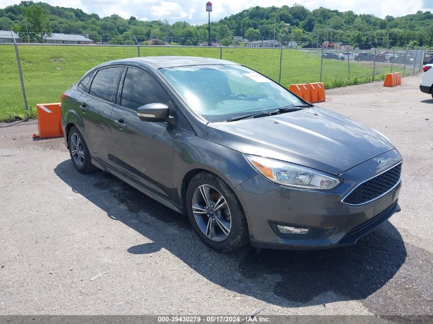 2015 Ford Focus Se VIN: 1FADP3F27FL286983 Lot: 39430279