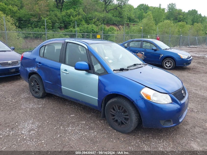 2012 Suzuki Sx4 Le/Le Popular VIN: JS2YC5A35C6302410 Lot: 39430657