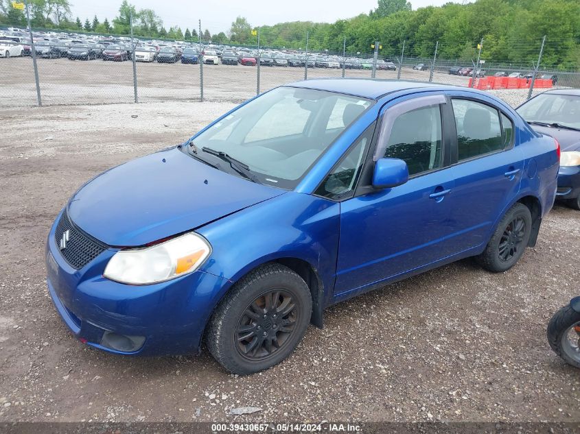 2012 Suzuki Sx4 Le/Le Popular VIN: JS2YC5A35C6302410 Lot: 39430657