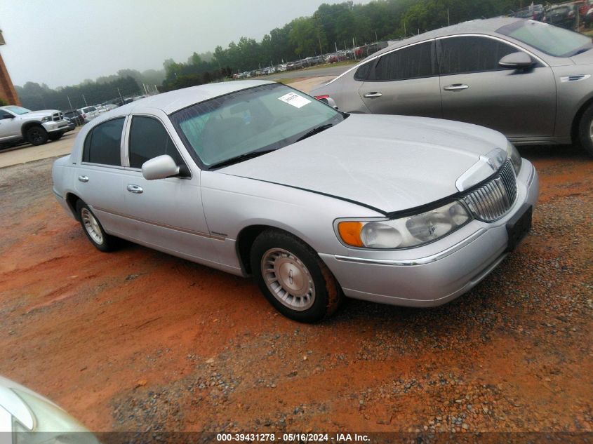 1999 Lincoln Town Car Executive VIN: 1LNHM81W7XY713204 Lot: 39431278